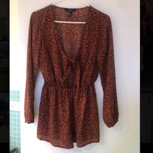 Orange/brown floral romper